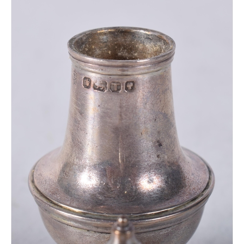 1240 - AN UNUSUAL MINIATURE VICTORIAN SILVER PEPPER POT. Sheffield 1886. 24.5 grams. 7.25cm x 3 cm.