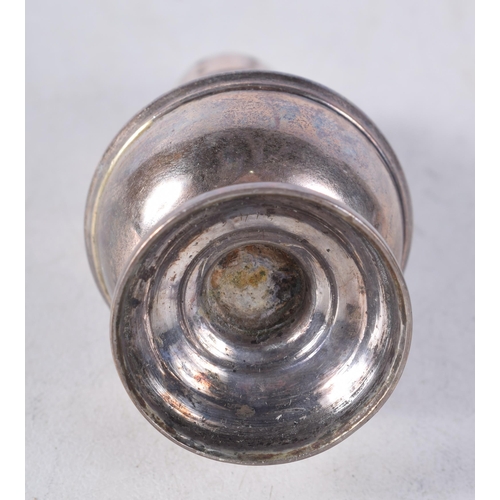 1240 - AN UNUSUAL MINIATURE VICTORIAN SILVER PEPPER POT. Sheffield 1886. 24.5 grams. 7.25cm x 3 cm.