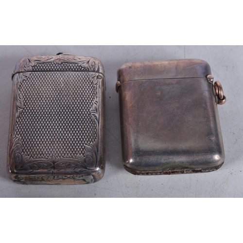 1242 - TWO ANTIQUE SILVER VESTA CASES. 85.3 grams. 5.25cm x 3.5 cm. (2)