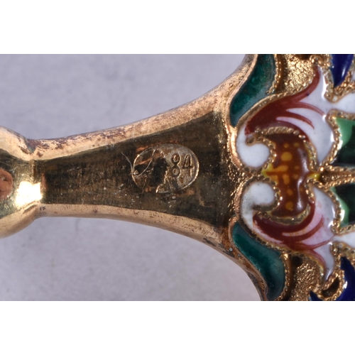 1251 - A Continental Silver Gilt and Enamel Shovel Spoon. Stamped 84. 16.5cm x 3.5cm, weight 78g