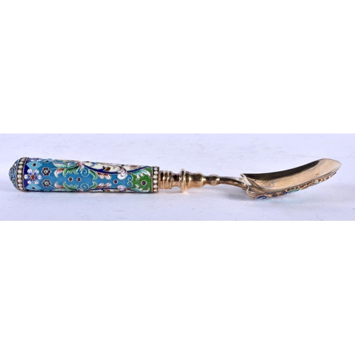 1251 - A Continental Silver Gilt and Enamel Shovel Spoon. Stamped 84. 16.5cm x 3.5cm, weight 78g