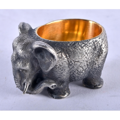 1253 - A Continental Silver Elephant Salt with Gilt interior. Stamped 84. 3.1cm x 4.8cm x 3.2cm, weight 126... 