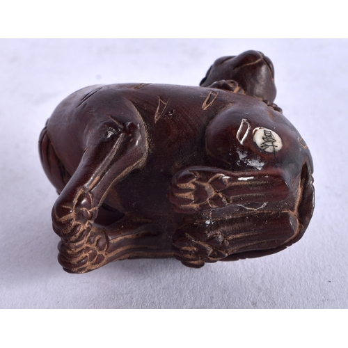 1263 - A Carved Hardwood Netsuke in the form of a Beast with a Cub on its back. 3.3cm x 4.3cm x 2.8cm, weig... 