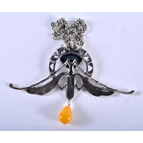 1272 - A Silver Pendant Necklace in the form of a Nouveau Style Dragonfly with an Amber Type droplet. Stamp... 