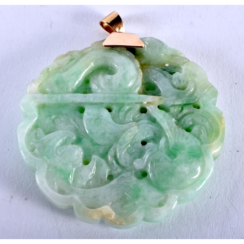 1277 - A Carved Jade Pendant with 18 Carat Gold Mount. Stamped 18K, 4.7cm diameter, weight 33.2g