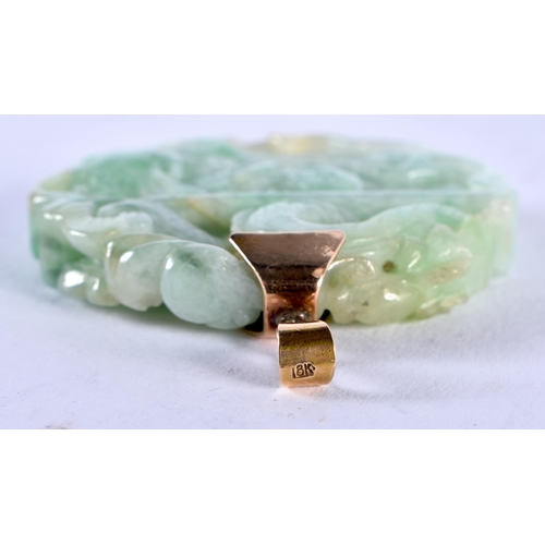 1277 - A Carved Jade Pendant with 18 Carat Gold Mount. Stamped 18K, 4.7cm diameter, weight 33.2g