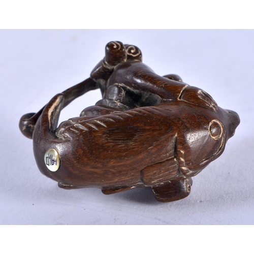 1278 - A Carved Hardwood Monkey riding a Gourd. 4 cm x 4.5cm x 2.5cm, weight 14.5g