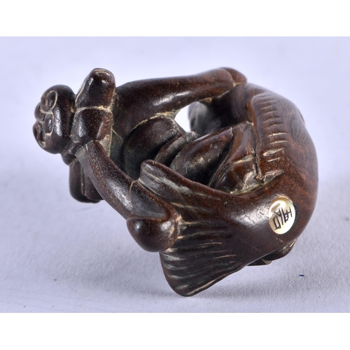 1278 - A Carved Hardwood Monkey riding a Gourd. 4 cm x 4.5cm x 2.5cm, weight 14.5g