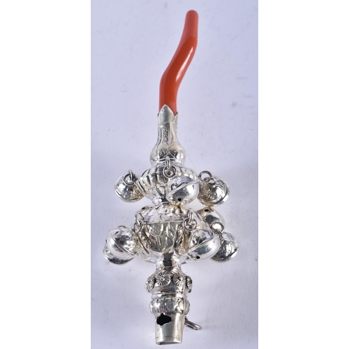 1282 - A White Metal Babies Rattle with Coral Teether by George Unite. 14cm x 5cm, weight 62.4g