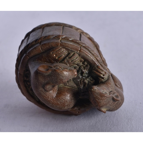 1285 - A Carved Hardwood Netsuke in the form of Rats climbing over a Barrel. 3.1cm x 4.1cm x 3cm, weight 23... 