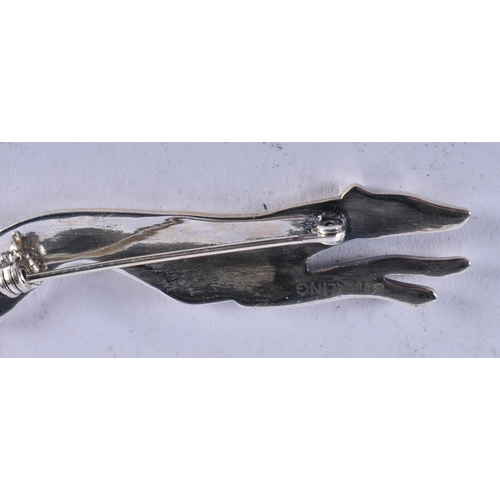 1286 - A Sterling Silver Greyhound Brooch. Stamped Sterling. 6.8cm x 1.3cm, weight 8.6g