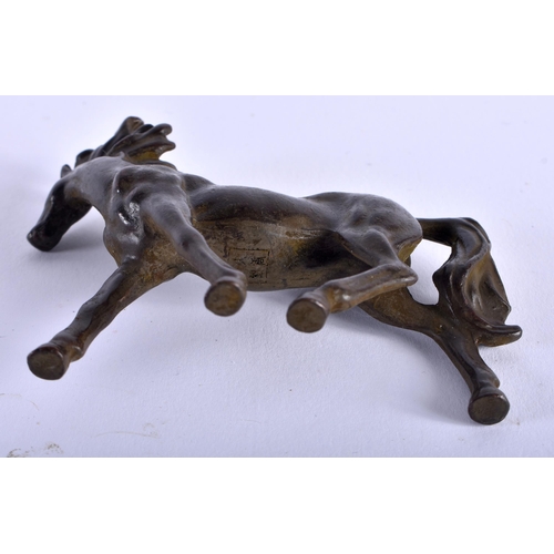 1292 - A Japanese Bronze of a Horse with Flowing Mane and Tail. 8cm x 9cm x 2.2cm, weight 181g