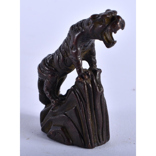 1296 - A Japanese Bronze Roaring Tiger on a Rock. 5.1cm x 4.3cm x 1.9cm, weight 72g