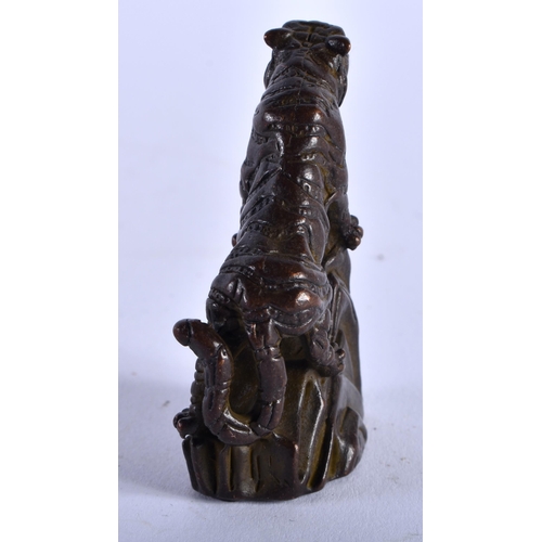 1296 - A Japanese Bronze Roaring Tiger on a Rock. 5.1cm x 4.3cm x 1.9cm, weight 72g