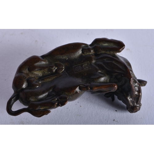 1303 - A Japanese Bronze of a Recumbent Water Buffalo. 6.4cm x 3.3cm x 2.2cm, weight 130g