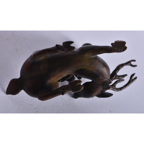 1304 - A Chinese Bronze of Shoulao Seated on a Deer. 6.5cm x 7.5cm x 3.6cm, weight 172g