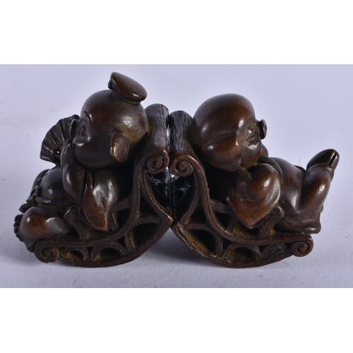 1306 - A Pair of Mythical Pigs in Rocking Chairs. 4.2cm x 2.8cm x 4.2cm, total weight 299g (2)