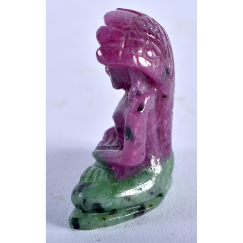 1328 - AN INDIAN CARVED RUBY AND JADE DEITY. 12.3 grams. 3 cm x 2.75 cm.