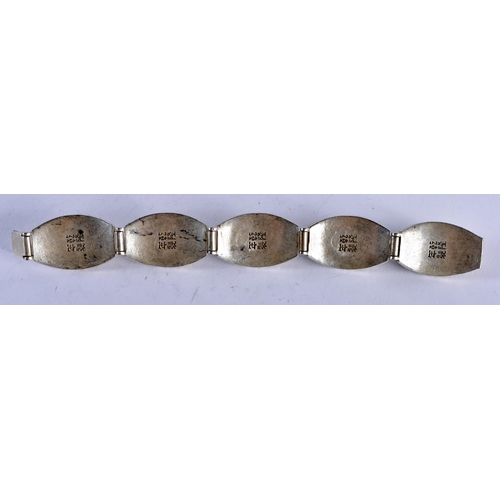 1330 - A CHINESE WHITE METAL BRACELET. 101 grams. 19 cm long.