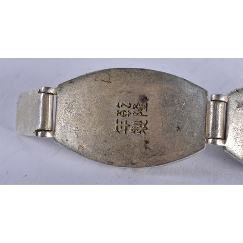 1330 - A CHINESE WHITE METAL BRACELET. 101 grams. 19 cm long.