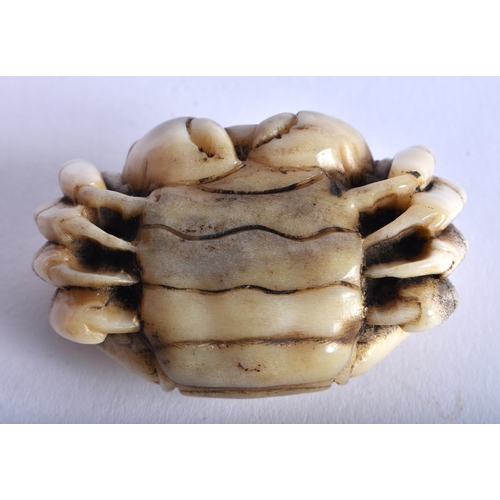 1334 - A JAPANESE CARVED BONE OKIMONO OF A CRAB. 45 grams. 5.75 cm x 3.75 cm.