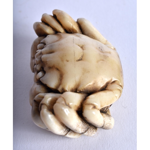 1334 - A JAPANESE CARVED BONE OKIMONO OF A CRAB. 45 grams. 5.75 cm x 3.75 cm.