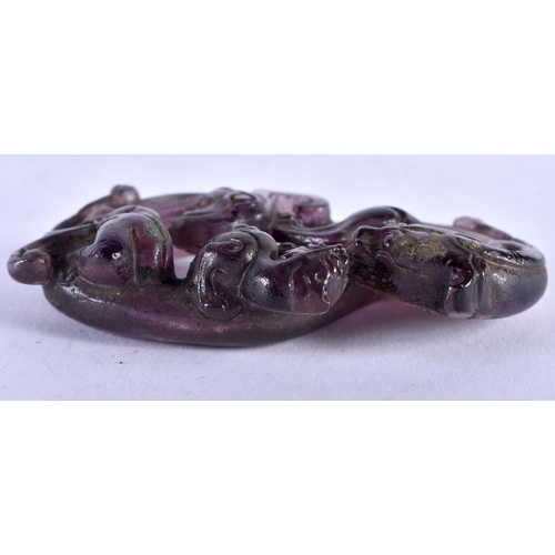 1347 - A CHINESE CARVED AMETHYST GLASS DRAGON. 58 grams. 7.5 cm x 5 cm.