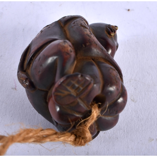 1349 - A JAPANESE CARVED WOOD MONKEY NETSUKE. 24 grams. 4.25cm x 3 cm.