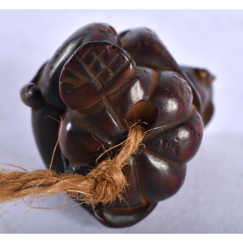 1349 - A JAPANESE CARVED WOOD MONKEY NETSUKE. 24 grams. 4.25cm x 3 cm.