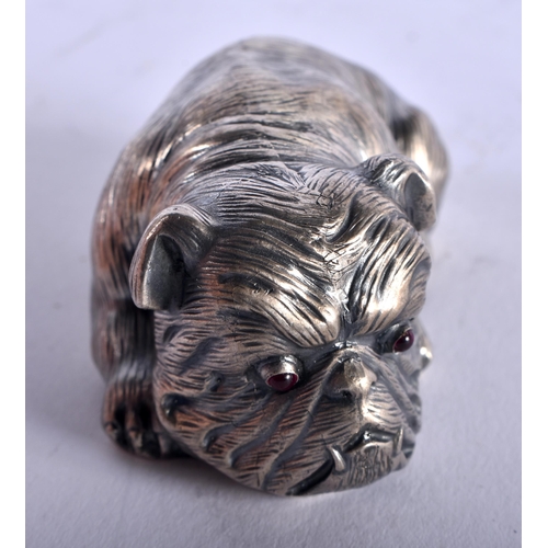 1352 - A CONTINENTAL SILVER RUBY EYED DOG. 58 grams. 6.5 cm x 3.5 cm.