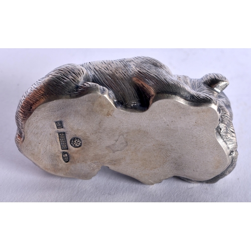 1352 - A CONTINENTAL SILVER RUBY EYED DOG. 58 grams. 6.5 cm x 3.5 cm.