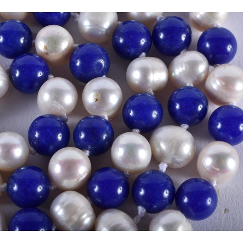 1358 - A PEARL AND LAPIS LAZULI NECKLACE. 110 grams. 122 cm long.