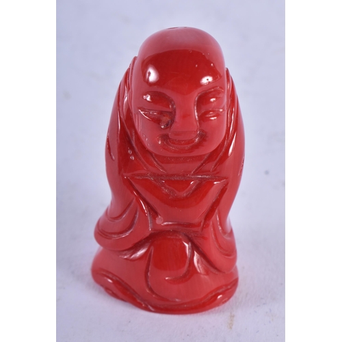 1392 - A CHINESE CORAL BUDDHA. 35 grams. 4.75 cm x 2.5 cm.