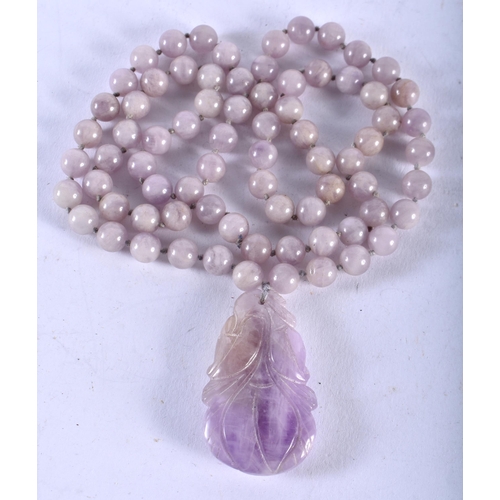 1393 - A CHINESE LAVENDER JADE NECKLACE. 76.4 grams. 69 cm long.