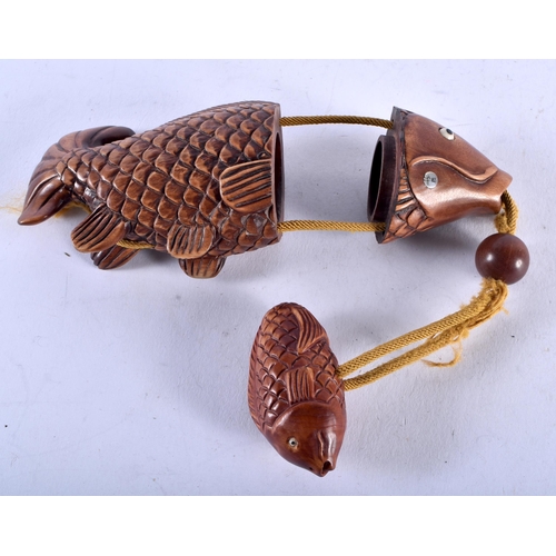 1395 - A JAPANESE CARVED WOOD FISH INRO. 66.5 grams. 11 cm x 5 cm.