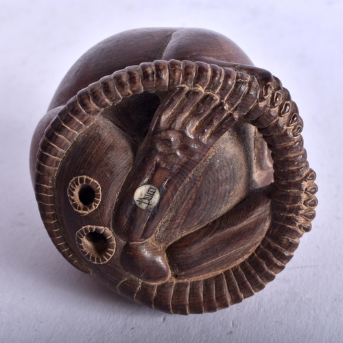 1396 - A JAPANESE CARVED HARDWOOD RAT NETSUKE. 66.3 grams. 5.5 cm x 5.5 cm.