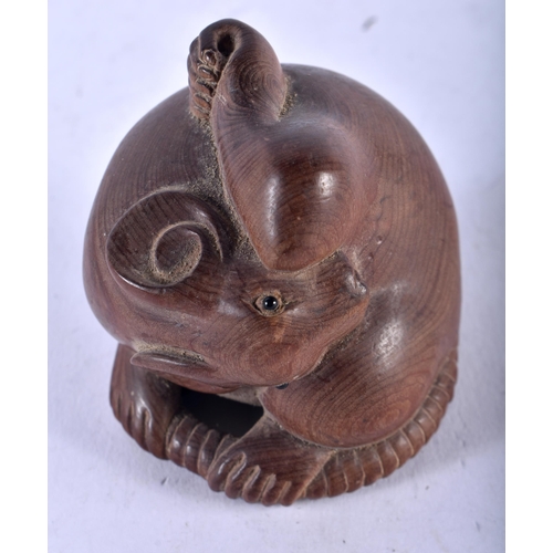 1396 - A JAPANESE CARVED HARDWOOD RAT NETSUKE. 66.3 grams. 5.5 cm x 5.5 cm.