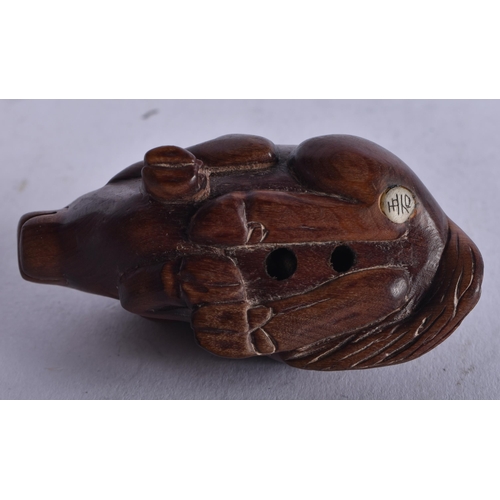 1403 - A JAPANESE BOXWOOD RAM NETSUKE. 27.5 grams. 3.75 cm x 6.5 cm.