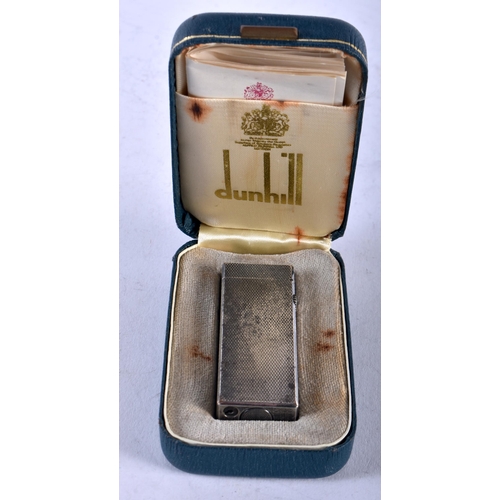 1412 - A Cased Dunhill Silver Type Lighter, with paperwork. 6.4cm x 2.3cm x 1.2cm, weight 78g