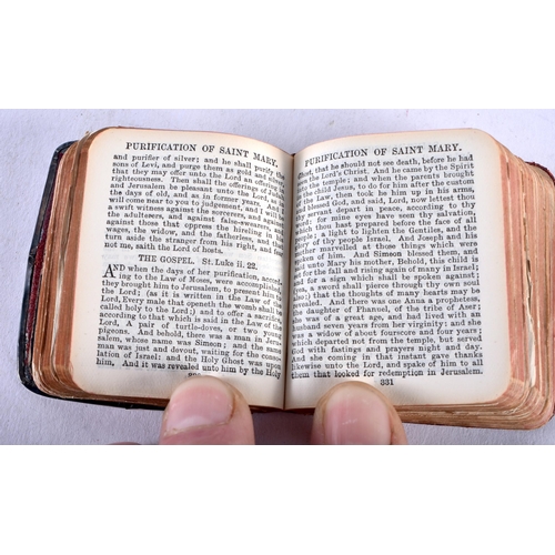 1422 - An Edwardian Common Prayer Book with Silver Mounts. Hallmarked Birmingham 1905. 5.6cm x 4.7cm x 1.4c... 