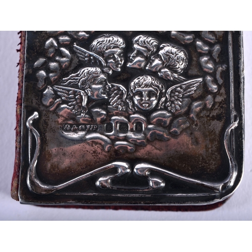 1426 - An Edwardian Common Prayer Book with Silver decoration in the form of Scrolls and Cherubs. Hallmarke... 