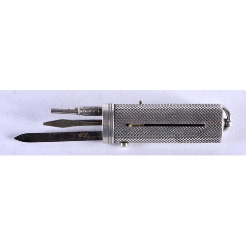 1427 - A Slide Action Combined Pencil, Penknife and Pick. 4.5cm x 1.5cm x 1cm (folded)