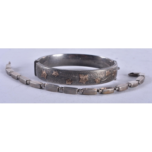 1434 - A Bright Cut Gold and Silver Bangle (5cm x 6cm internal). Hallmarked Chester 1957 together with a Si... 