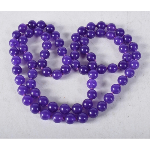 1449 - A Lavender Bead Necklace. 74cm long, Bead size 7mm, weight 60g