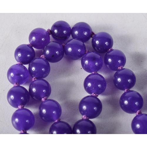 1449 - A Lavender Bead Necklace. 74cm long, Bead size 7mm, weight 60g