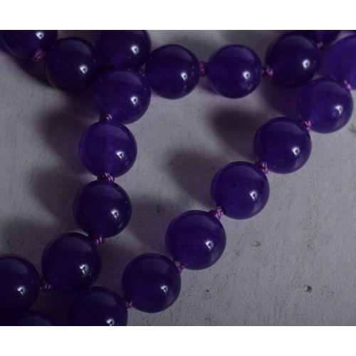 1449 - A Lavender Bead Necklace. 74cm long, Bead size 7mm, weight 60g