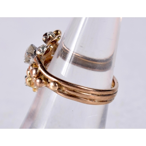 1473 - A YELLOW METAL AND DIAMOND RING. 5.1 grams. K.