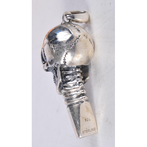 1495 - A SILVER SKULL WHISTLE. 17 grams. 4.75 cm x 1.75 cm.