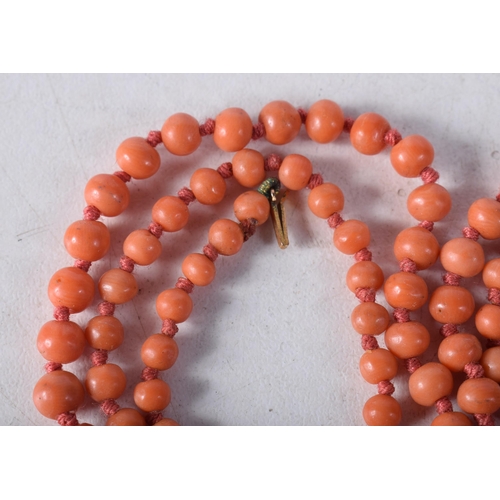 1500 - AN ANTIQUE CORAL NECKLACE. 15 grams. 64 cm long.