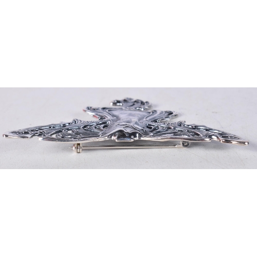 1511 - A Silver Brooch in the form of an Art Nouveau Style Girl. Stamped Sterling. 4.5cm x 7.4cm, weight 16... 